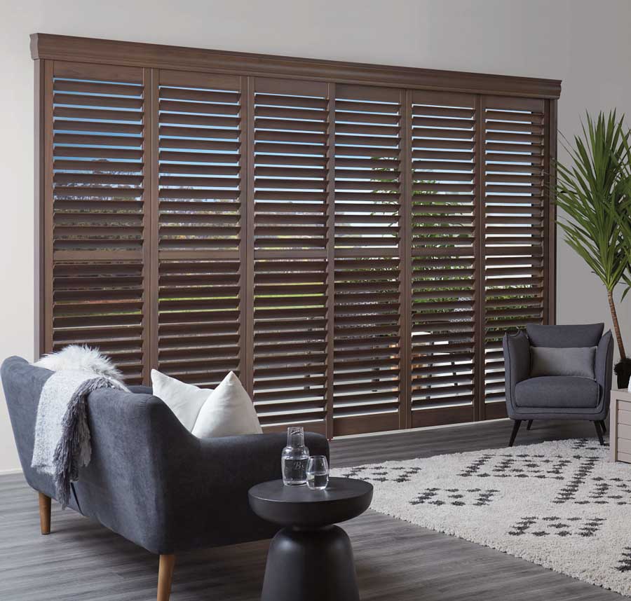 dark colored plantation shutters in living room