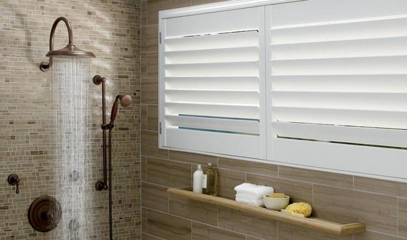 white shutters in shower in bathroom