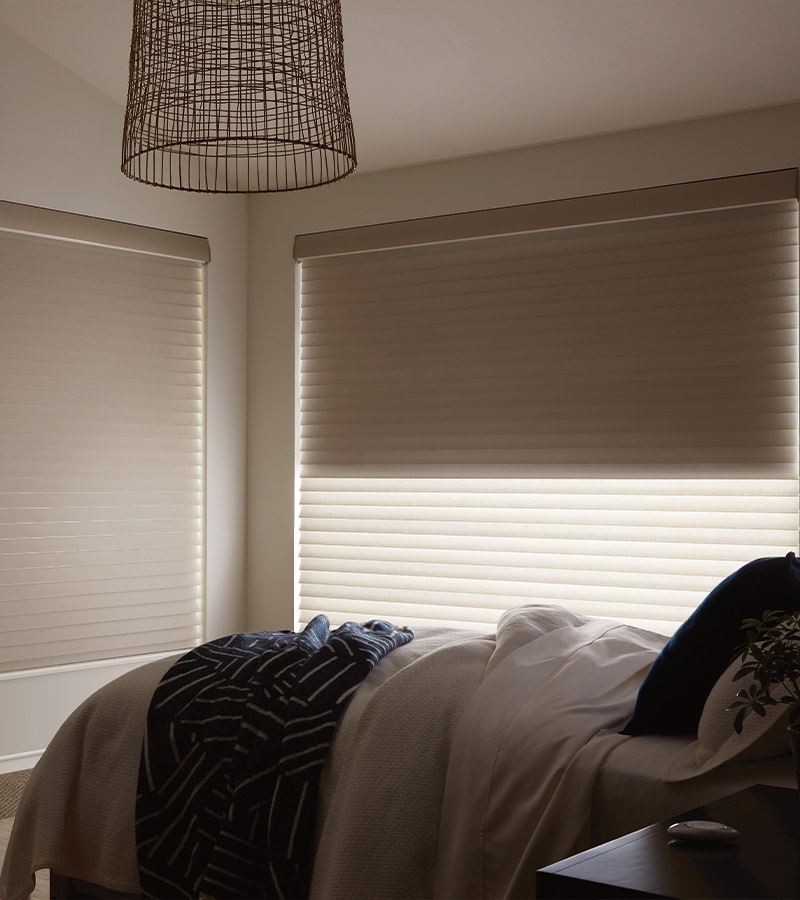 bedroom with dual window shades in custom shades of london