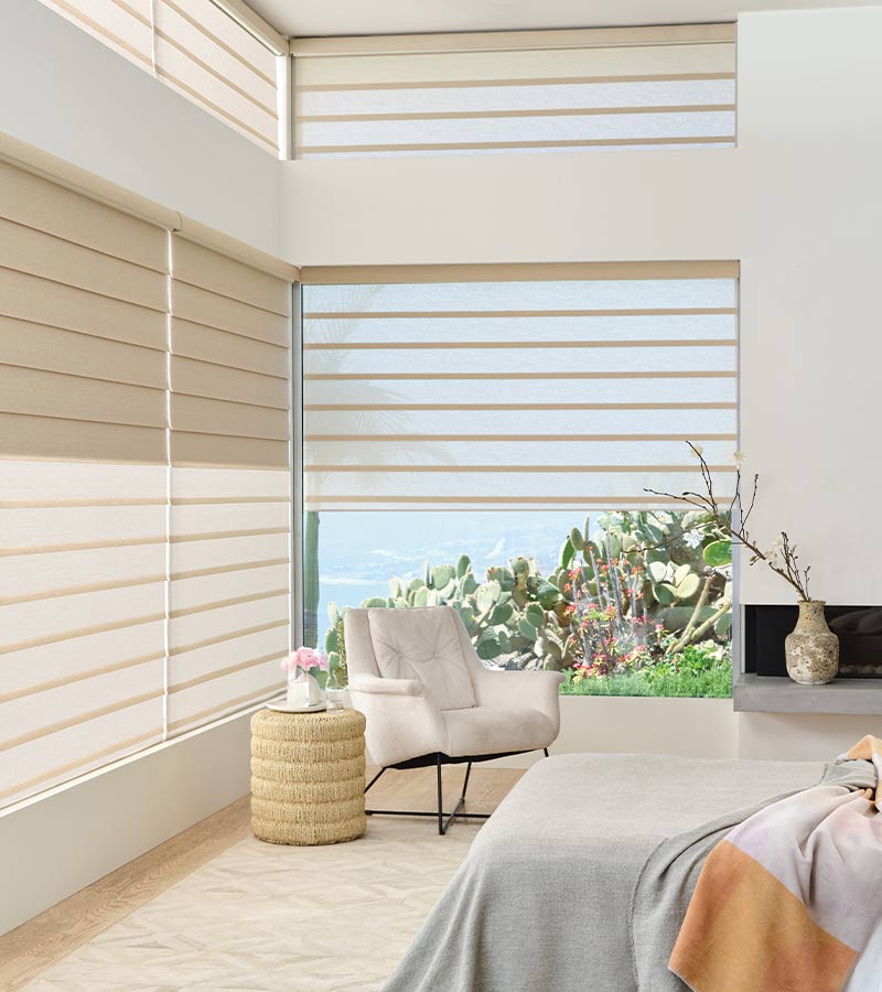 rolling roman shades with PowerView® Automation for continual adjustments during the day