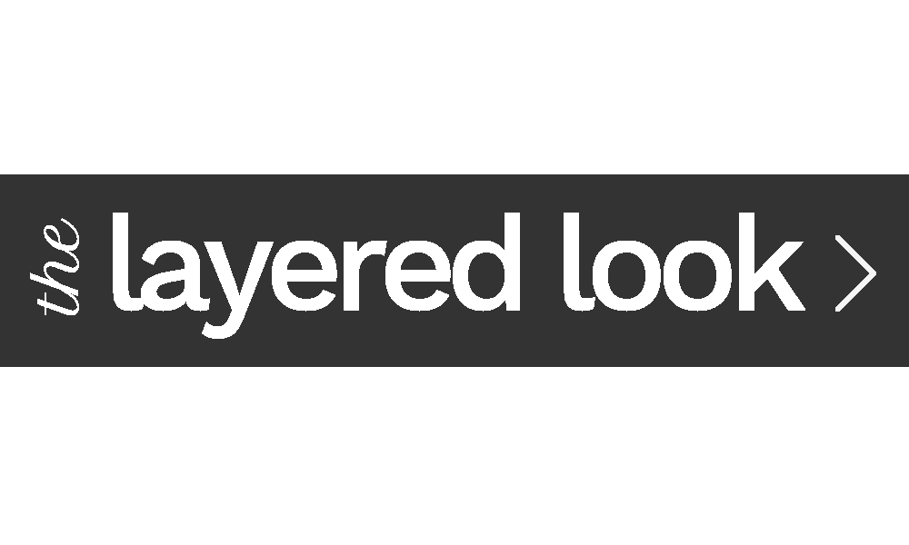 layering drapery with window treatments