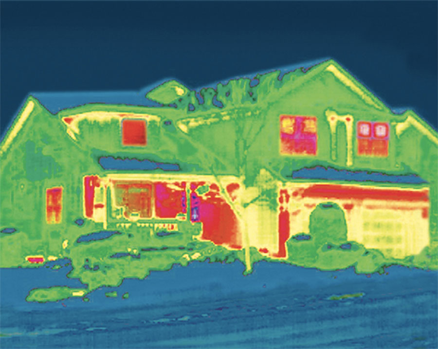 infrared image showing heat loss through uncovered windows in a home
